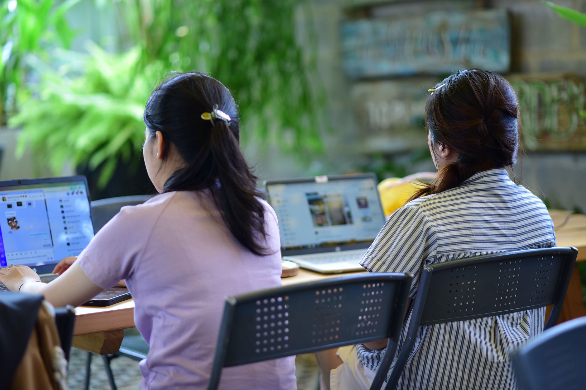Compliance team reviewing an accessibility statement checklist on a laptop with a map and legal notes