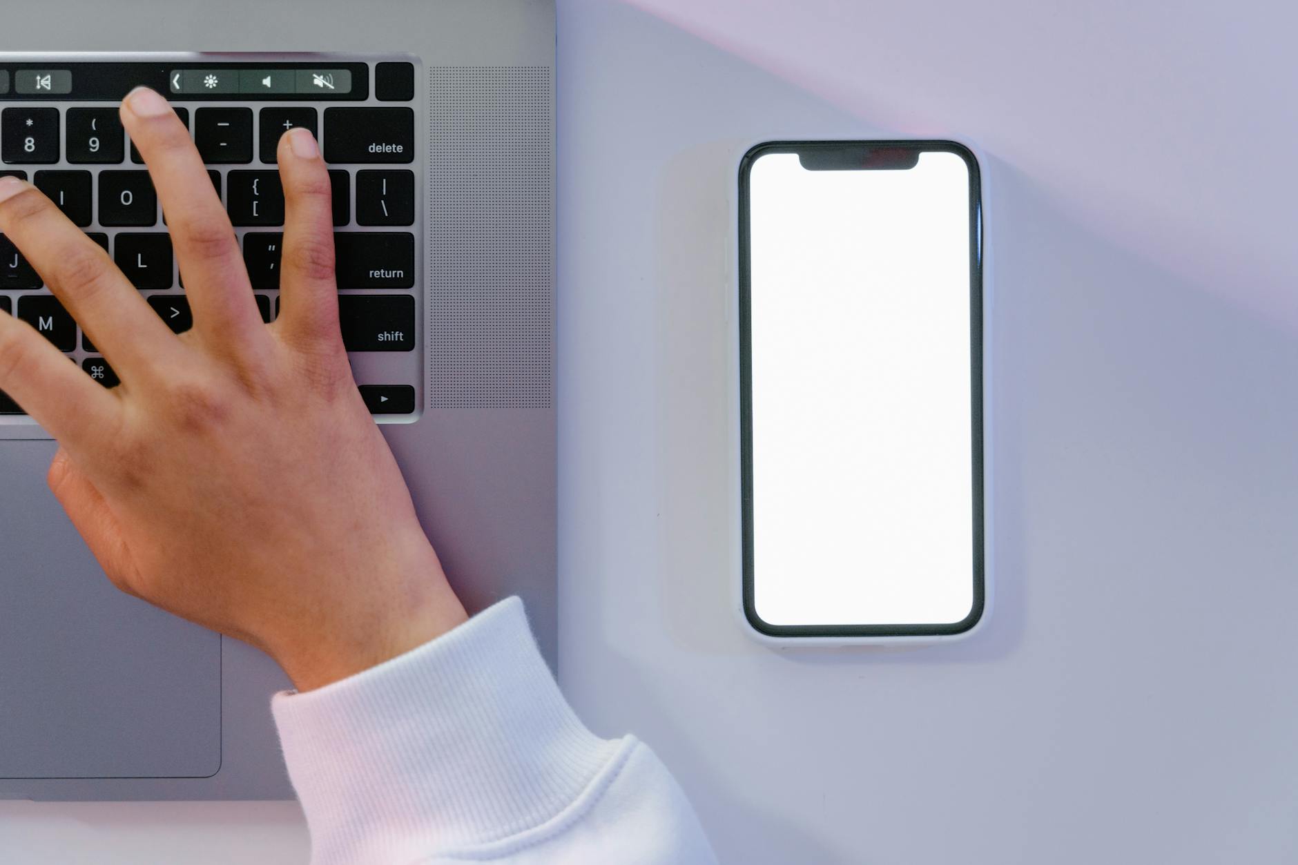 Designer reviewing accessibility checks in a Figma interface on a laptop