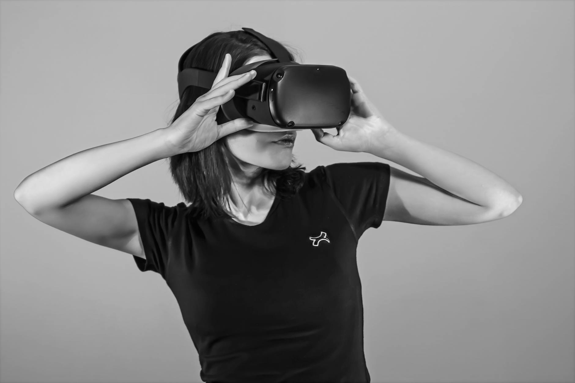 Designer testing accessibility flows across a headset, smart speaker, and mobile app