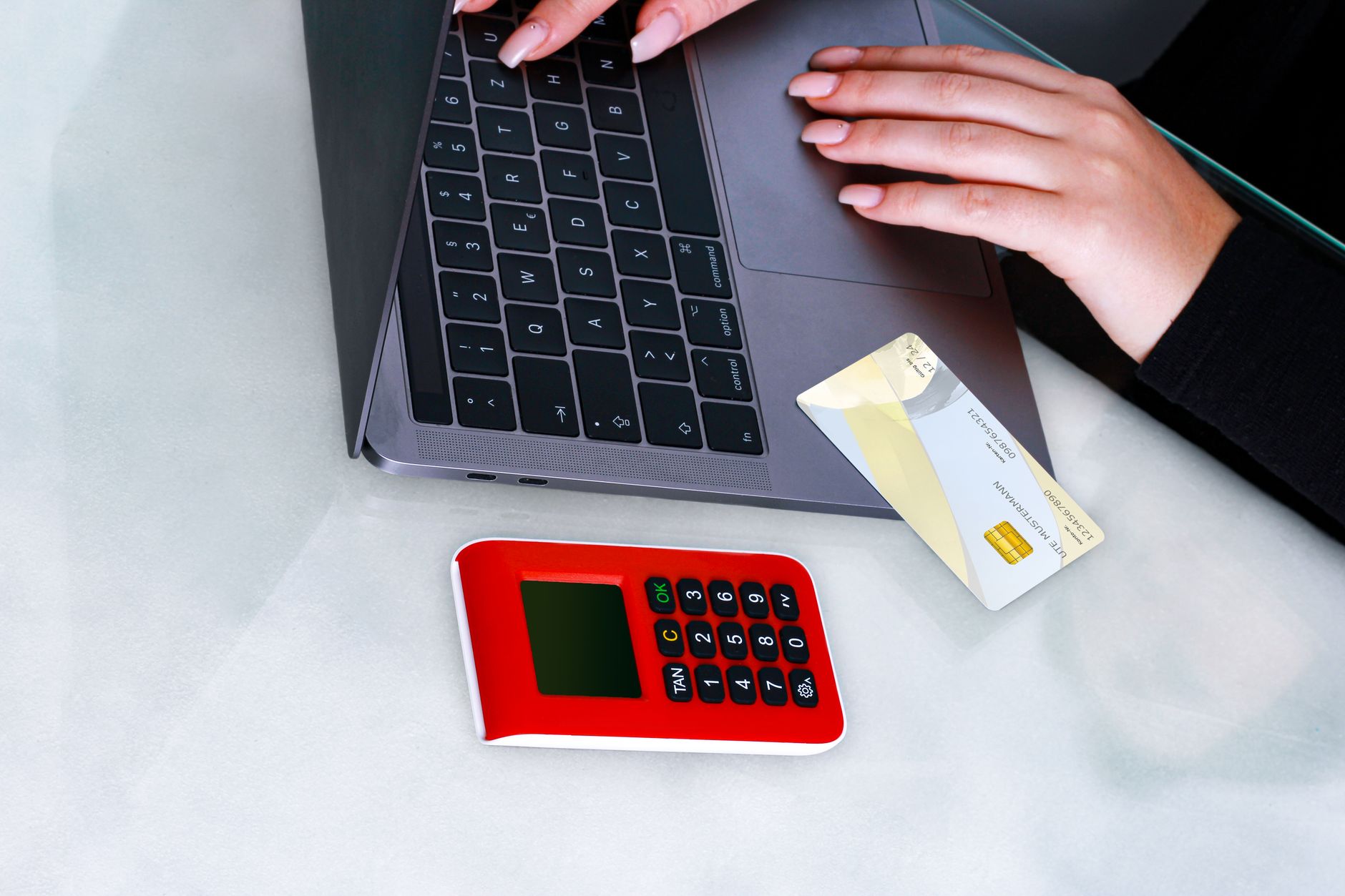 Customer using a laptop for online banking with an accessibility icon visible on screen