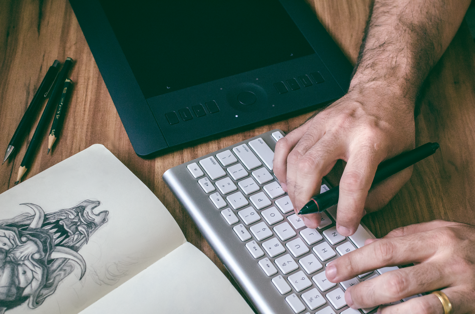 Editor reviewing an accessible news website layout on a laptop