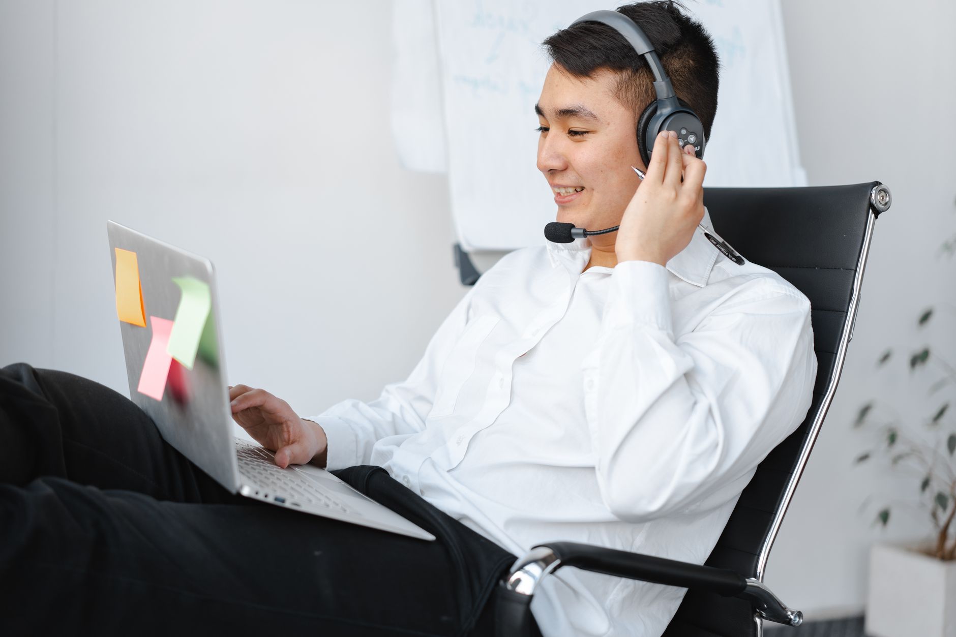 Customer using a smartphone with accessibility settings enabled while viewing a telecom account page