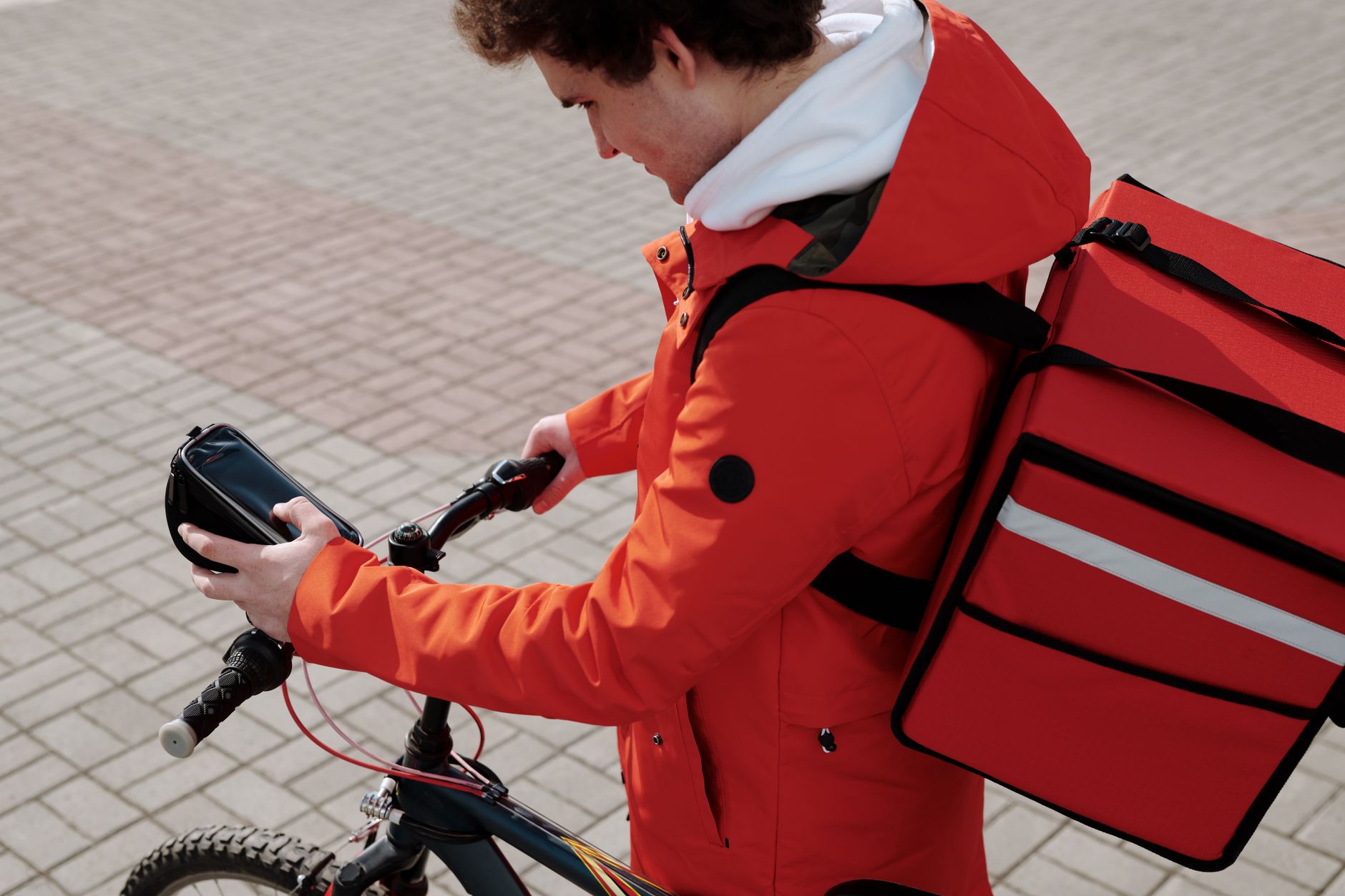 Person using a smartphone food ordering app with accessibility features enabled