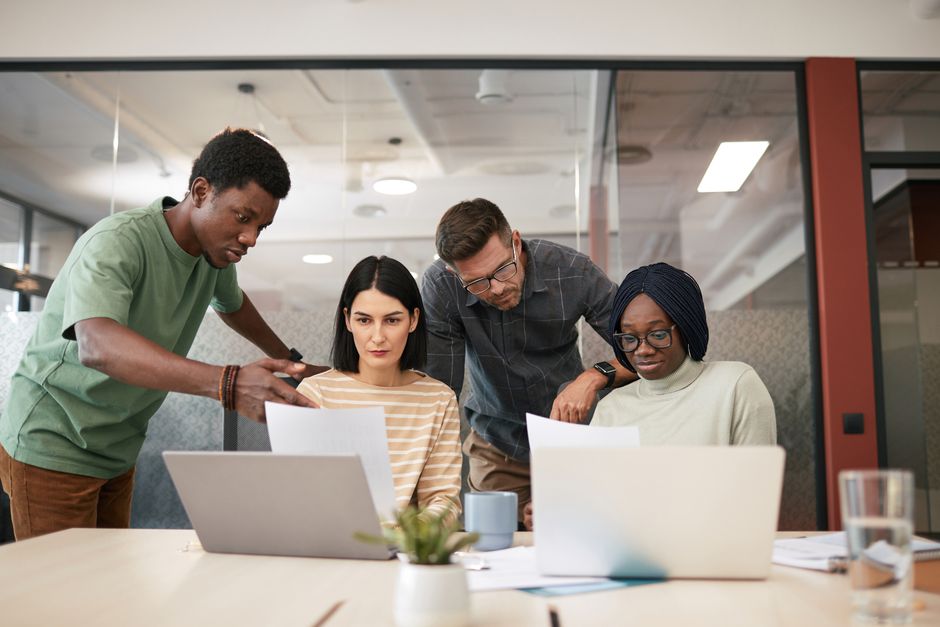 Website compliance team reviewing cookie consent settings on a laptop