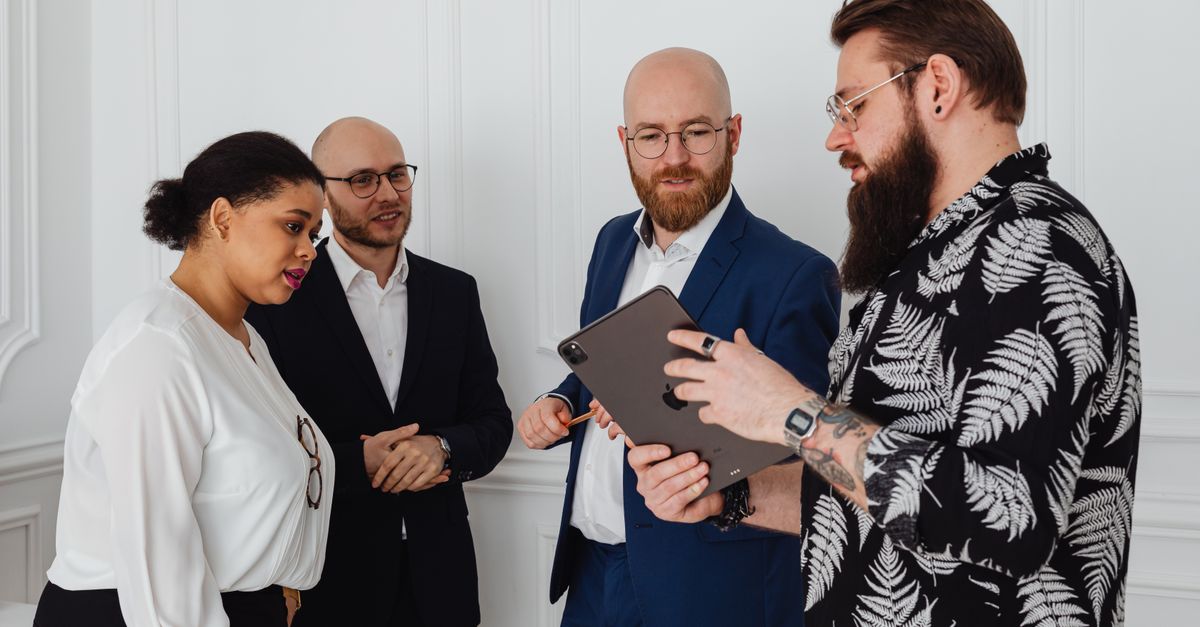 Digital team reviewing website images and AI-generated alt text for accessibility