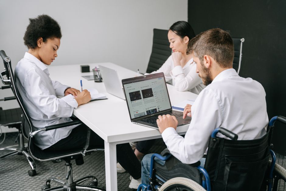 Team reviewing website accessibility issues beyond an overlay widget