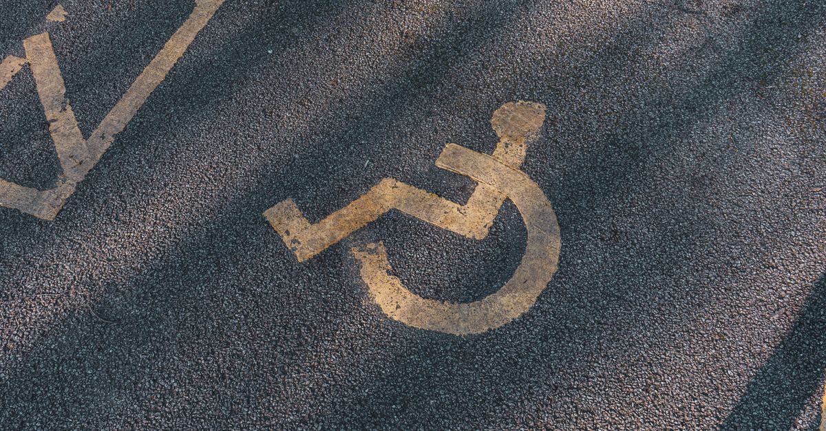 AI accessibility widget supporting website accessibility on a business laptop
