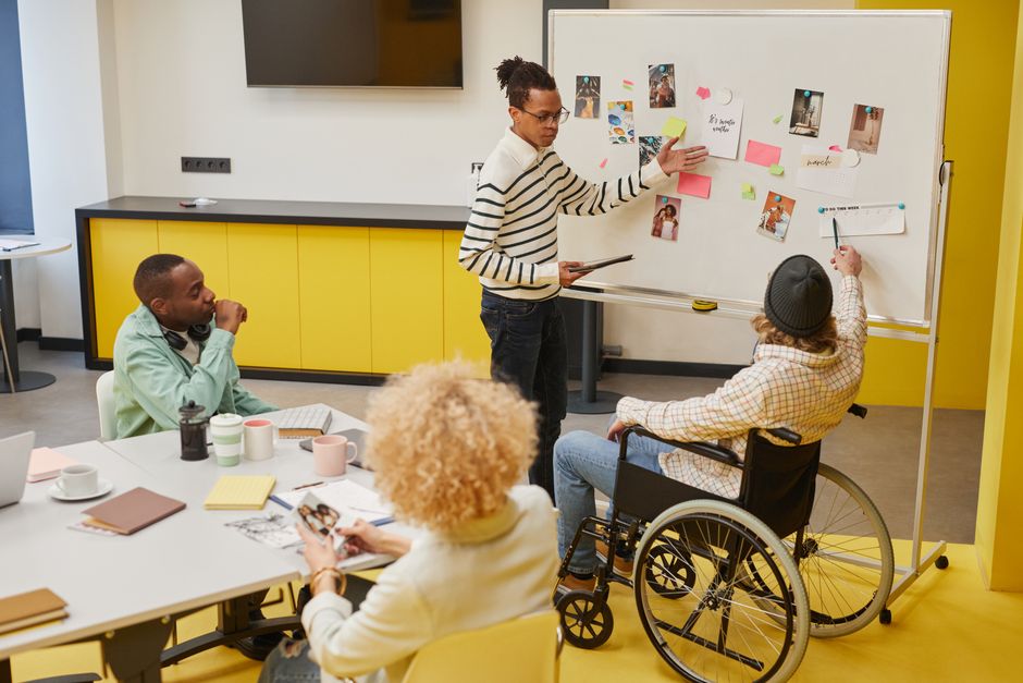 Team reviewing a WCAG 2.2 accessibility checklist before a website audit