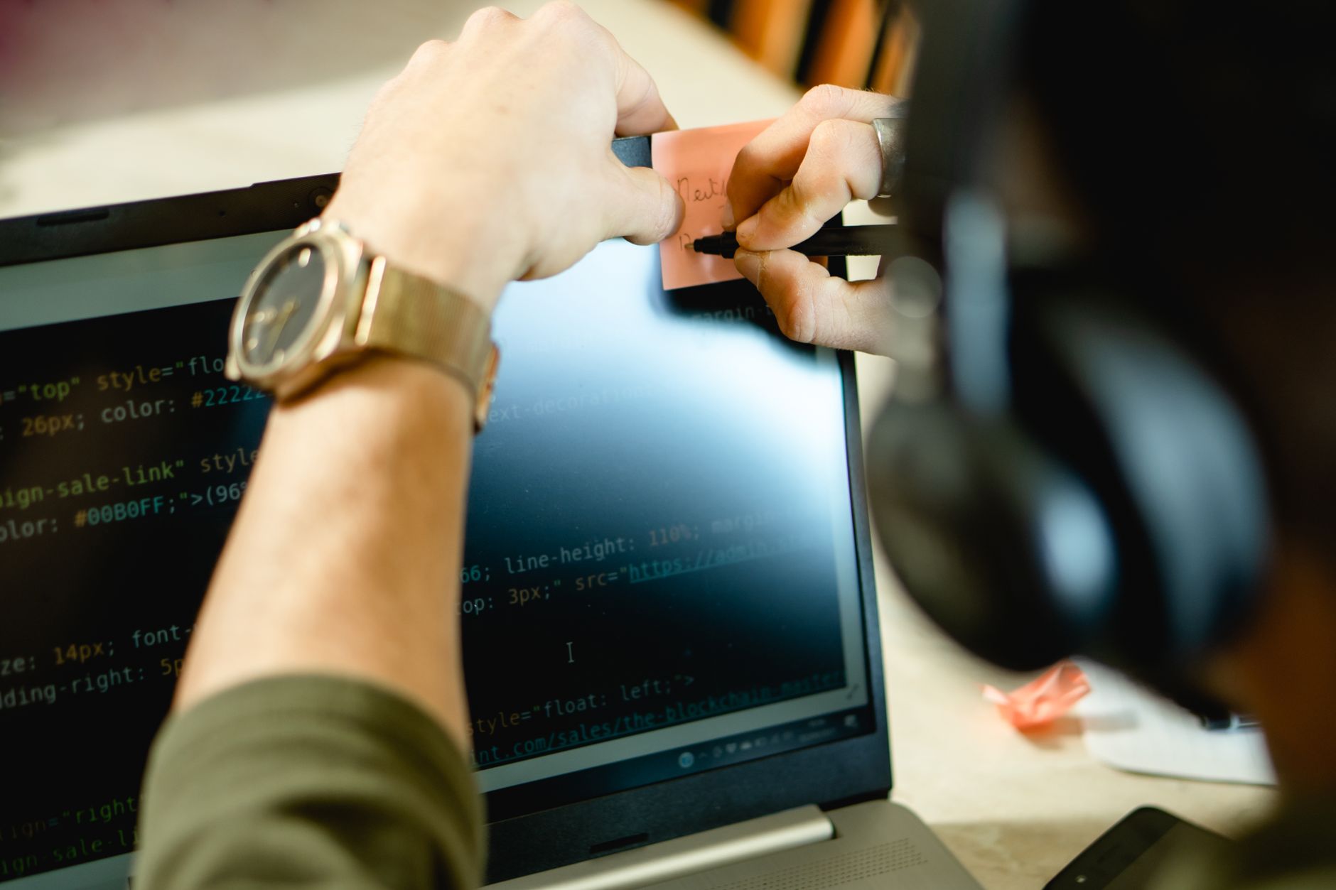 Accessibility specialist reviewing a website audit report on a laptop