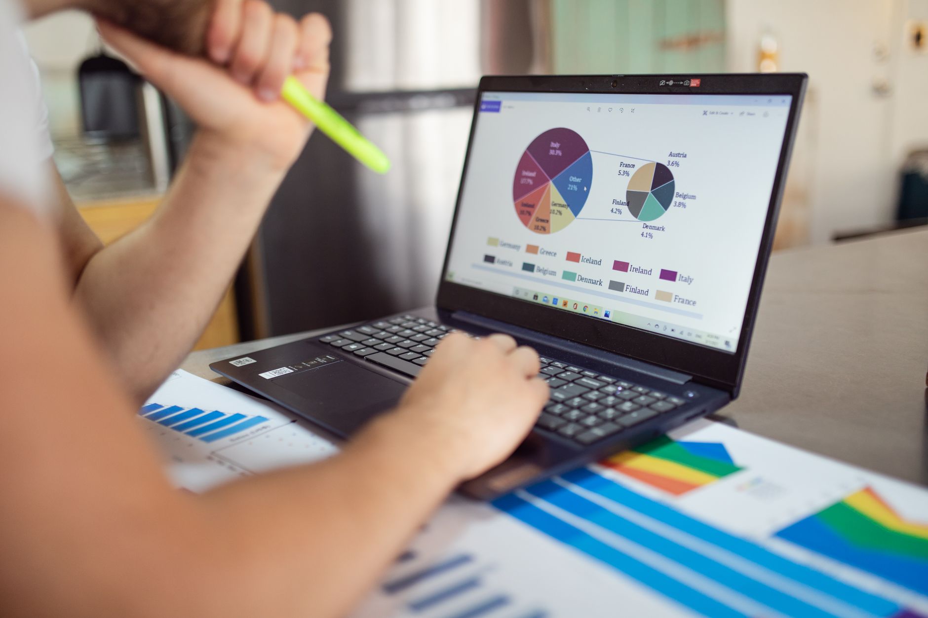 Accessibility specialist reviewing a website audit report on a laptop