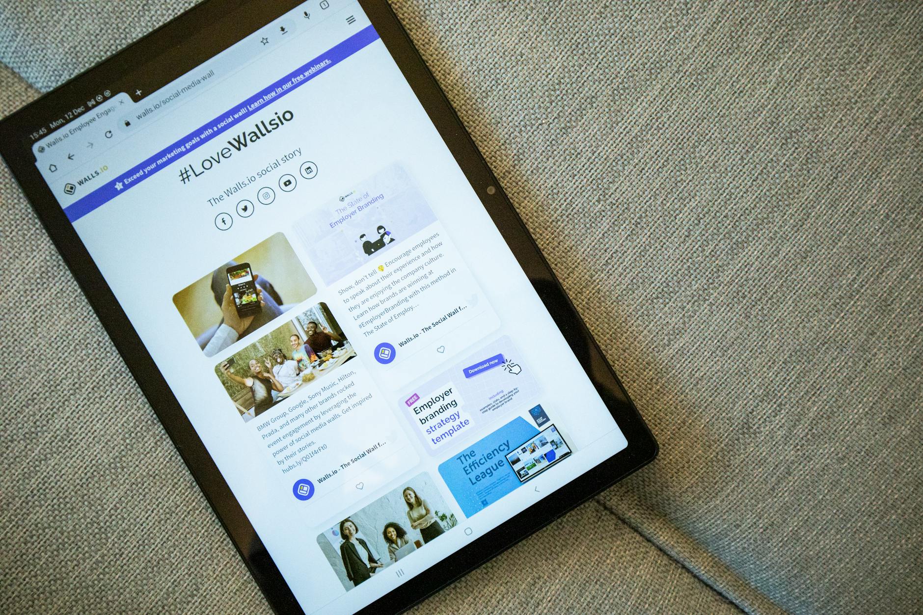 Designer reviewing accessibility checks in Figma next to a browser accessibility report on a laptop