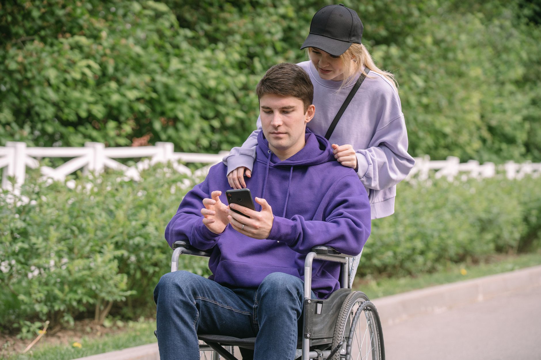 Public service employee reviewing an accessible government website on a laptop with accessibility checklist