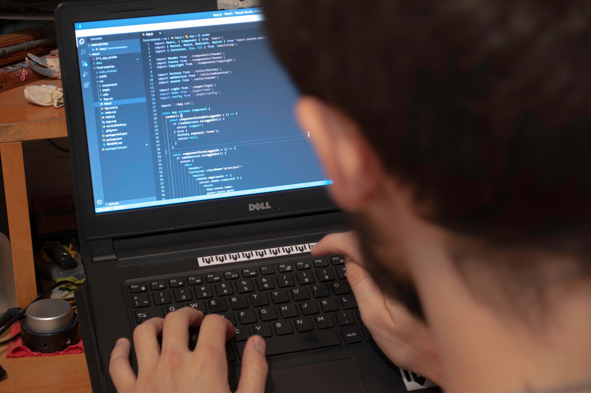 Accessibility specialist reviewing an AI-generated VPAT draft on a laptop with compliance notes