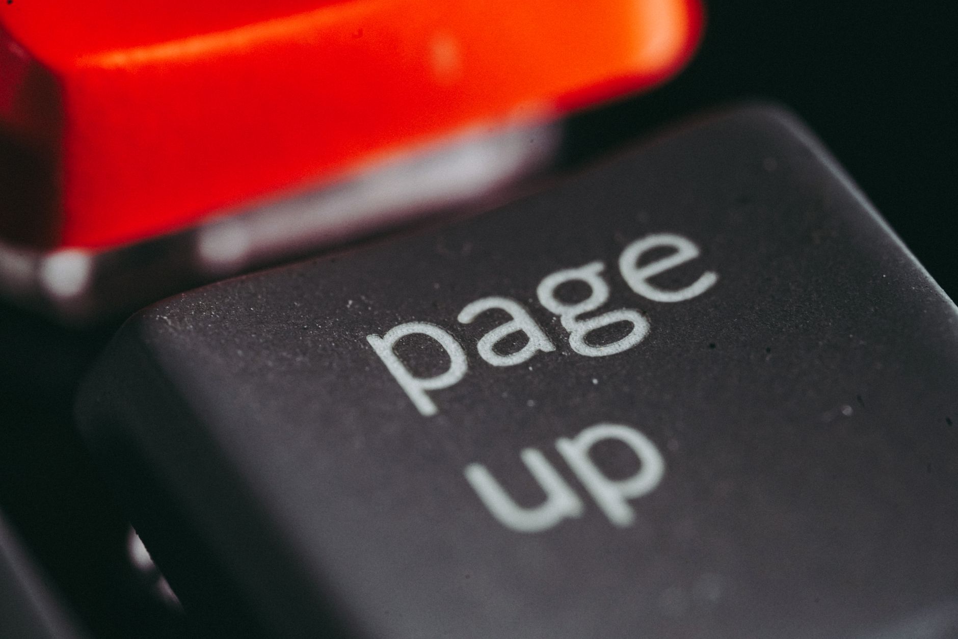 Person reviewing a cookie consent settings panel on a laptop with a checklist document beside it