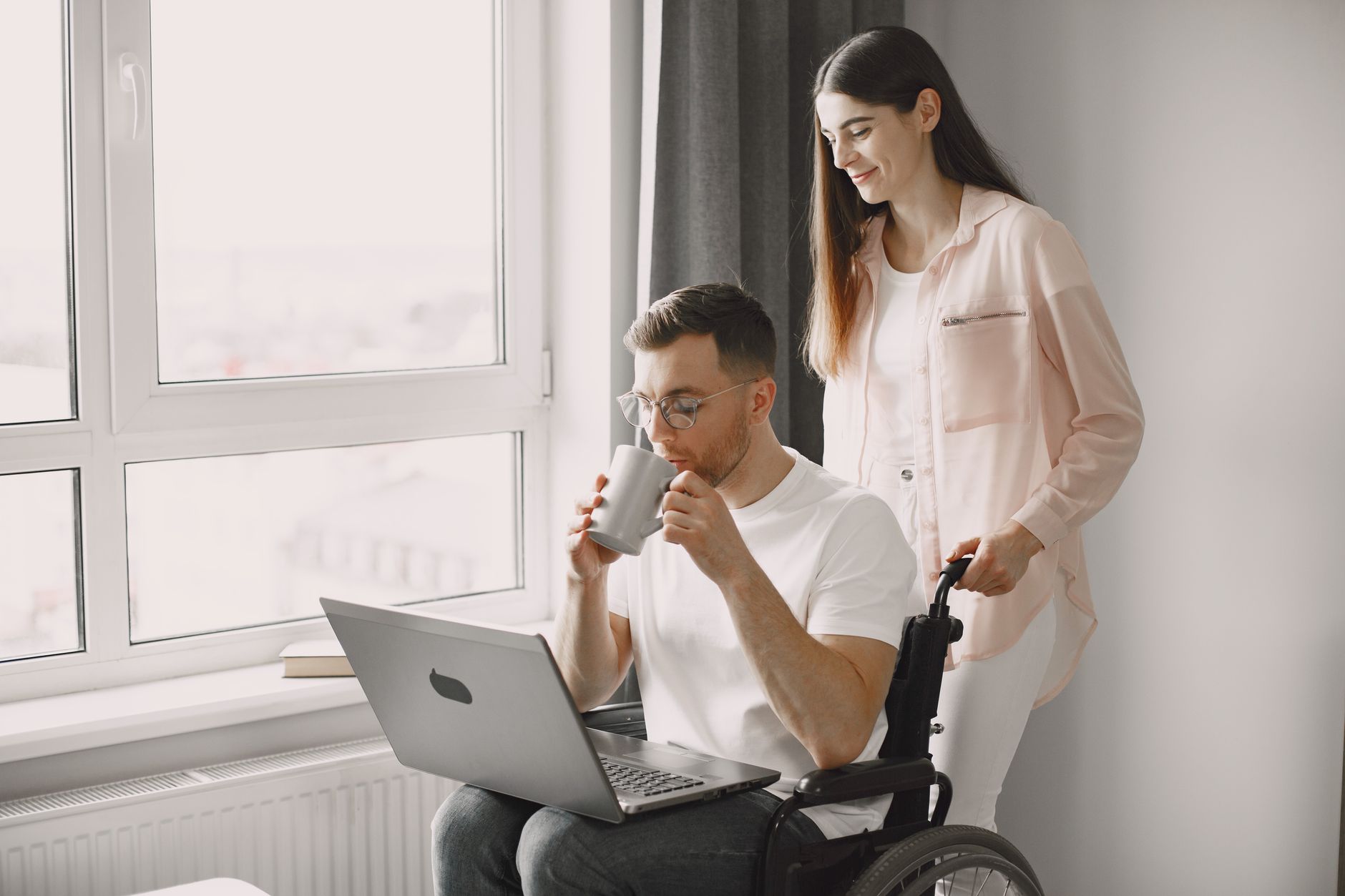 Person reviewing an accessible cookie consent banner on a laptop with clear accept and reject options