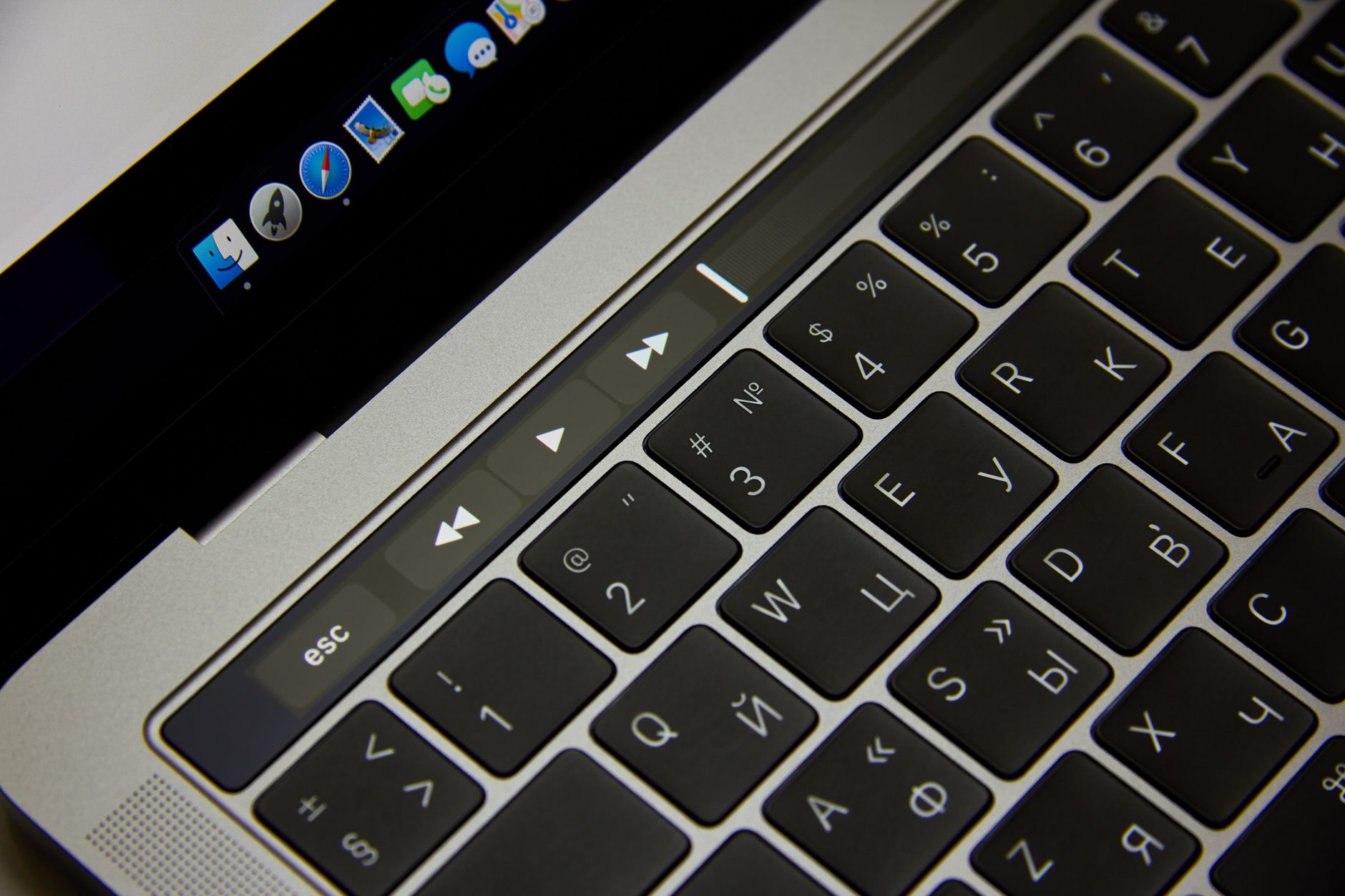 Person using a laptop with a cookie consent banner dialog visible, illustrating accessible consent design