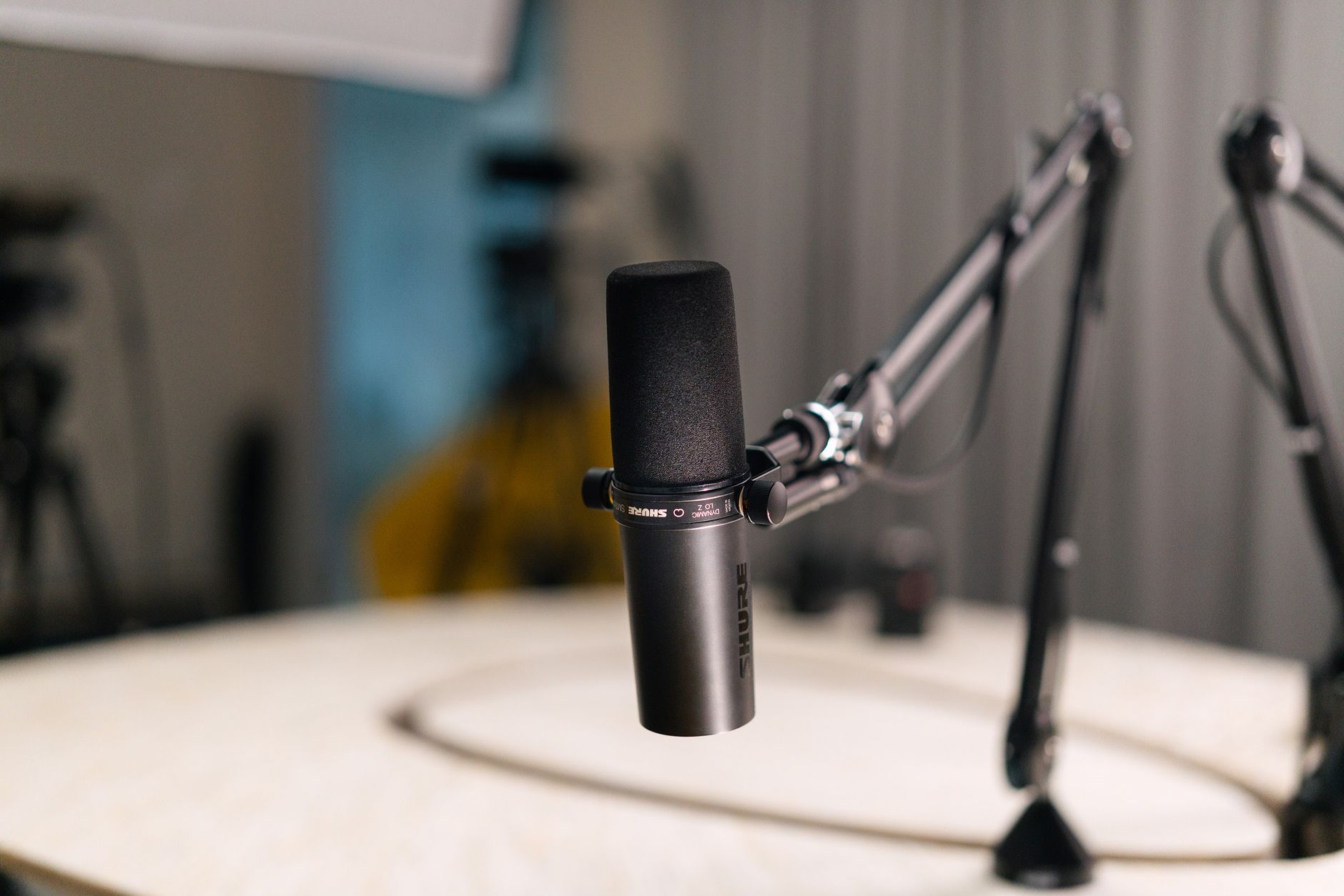 Accessibility tester reviewing an iOS app with VoiceOver enabled on an iPhone