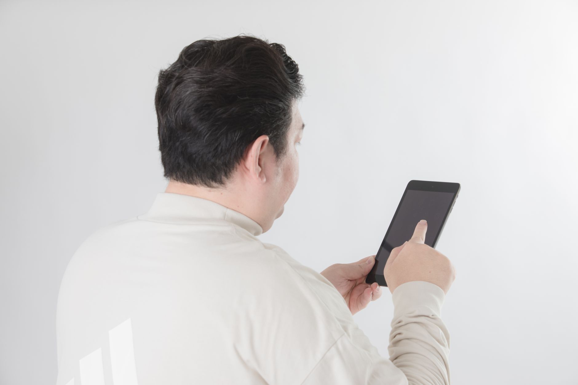 Person using a laptop on a government services website with accessibility settings visible