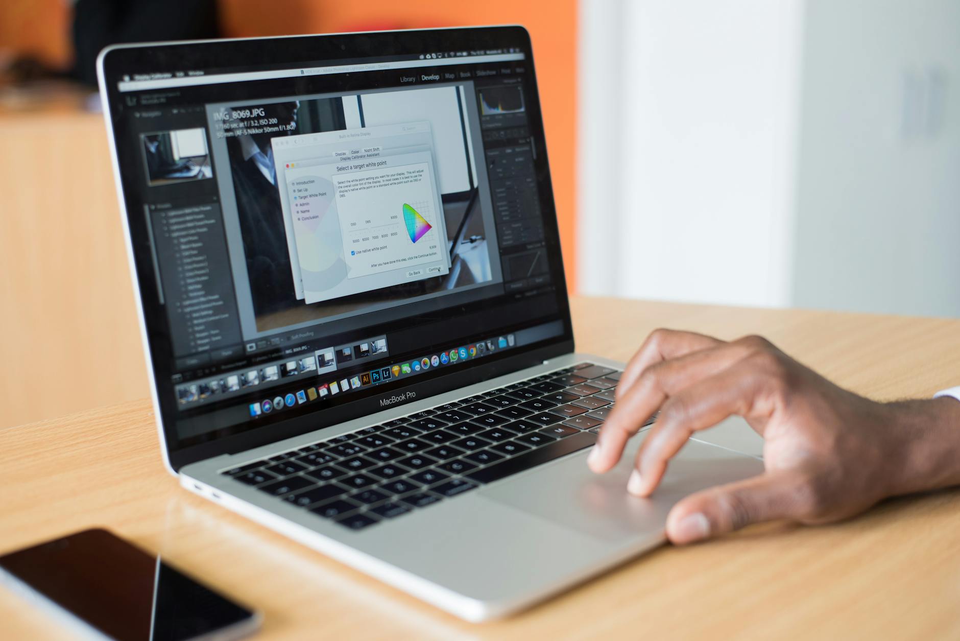 Developer reviewing website accessibility scan results on a laptop dashboard