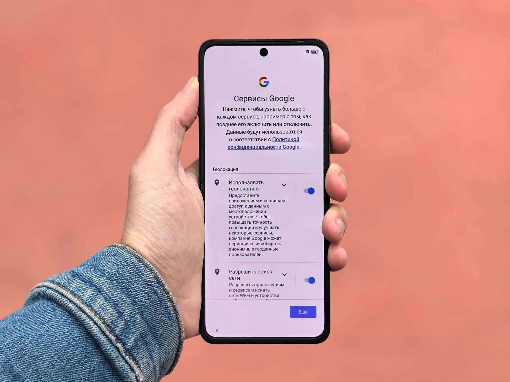 Accessibility tester reviewing a mobile app interface with a checklist on a desk