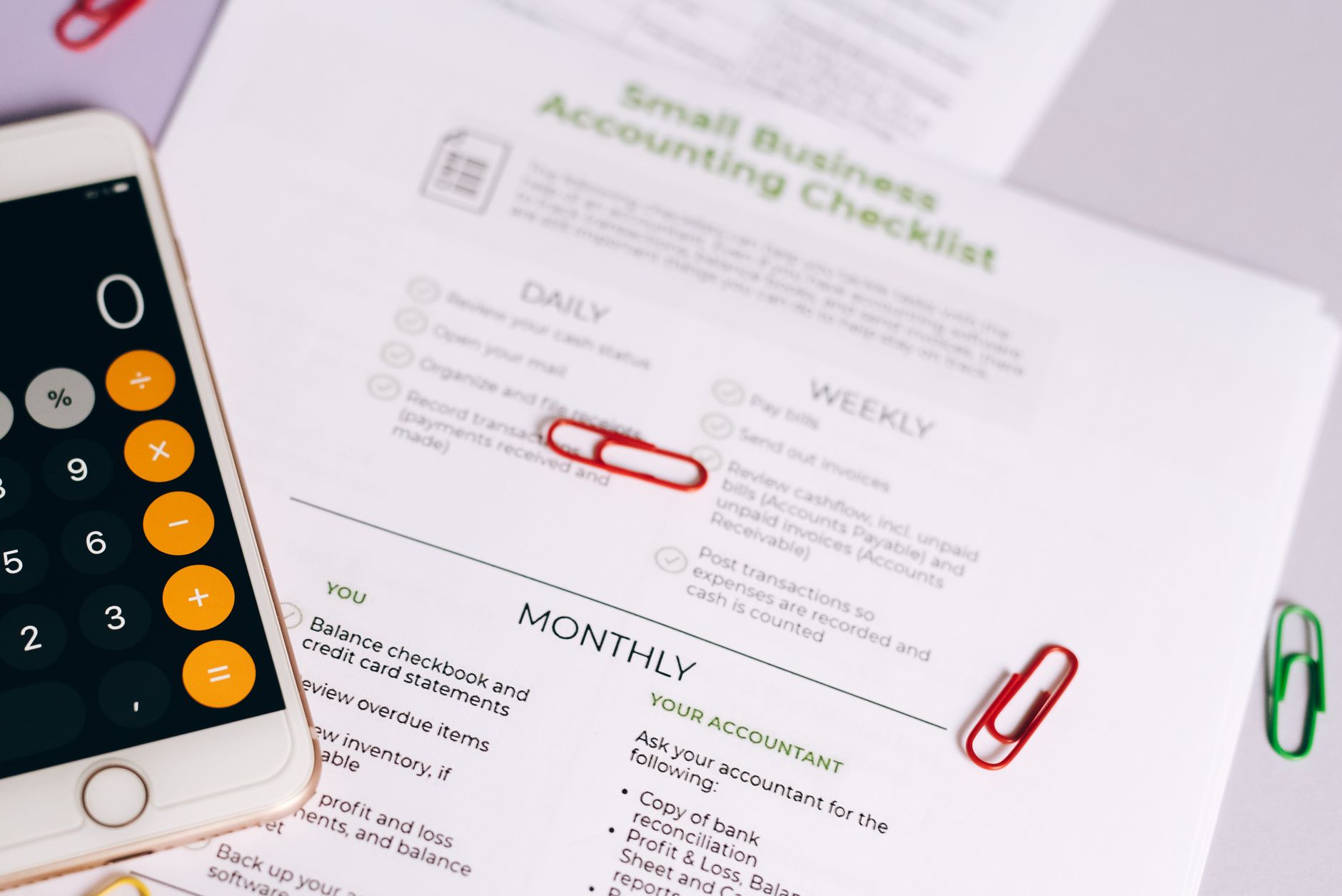 A person using a mobile banking app with accessibility features enabled on a smartphone