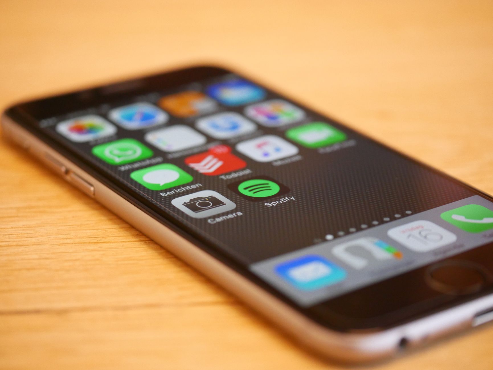 Accessibility specialist reviewing a mobile app with a screen reader and checklist