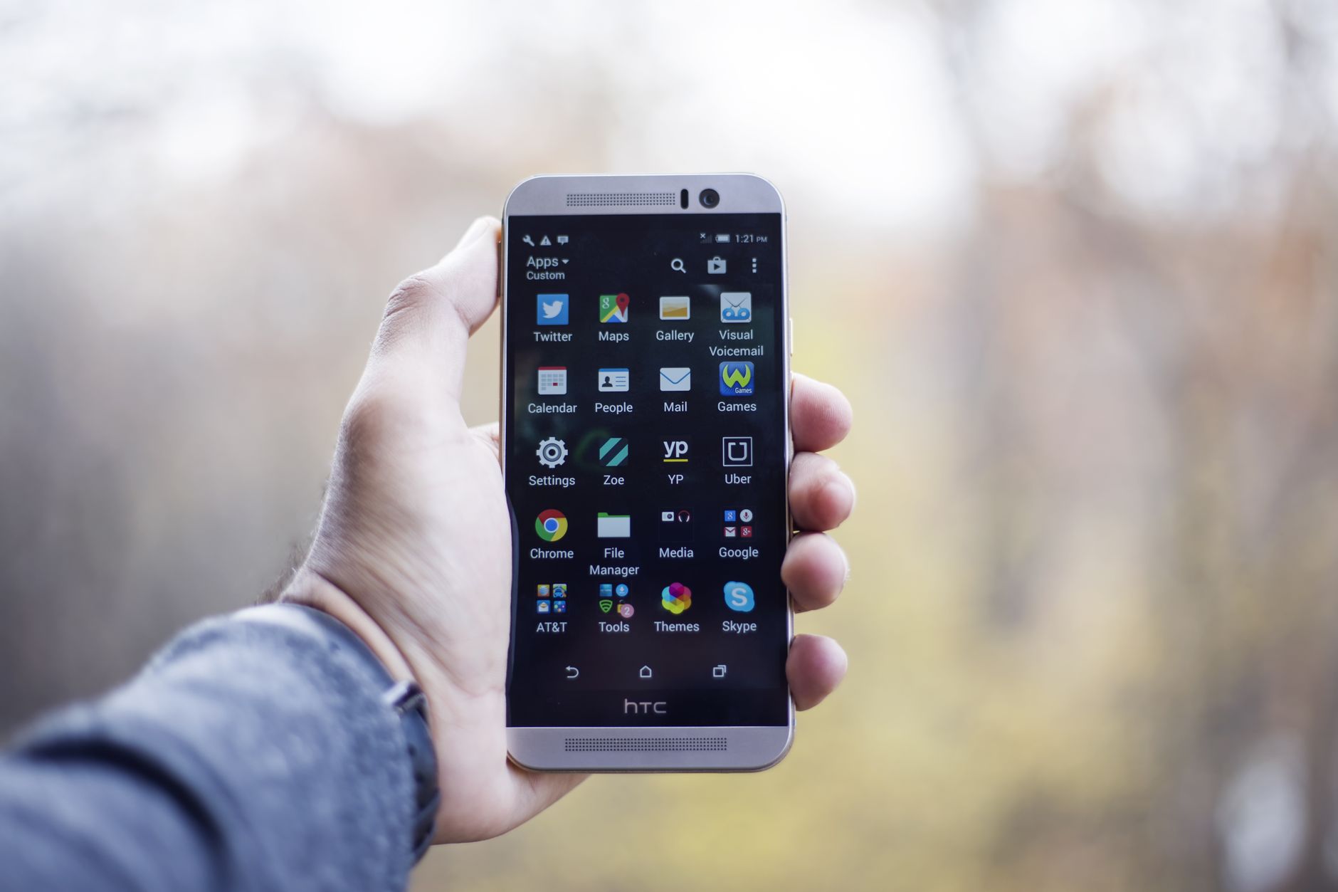 Accessibility specialist reviewing a mobile app with a screen reader and checklist