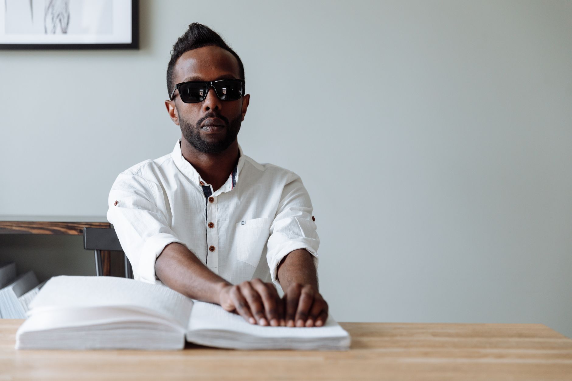 Content strategist reviewing accessibility-focused niche content outlines on a laptop
