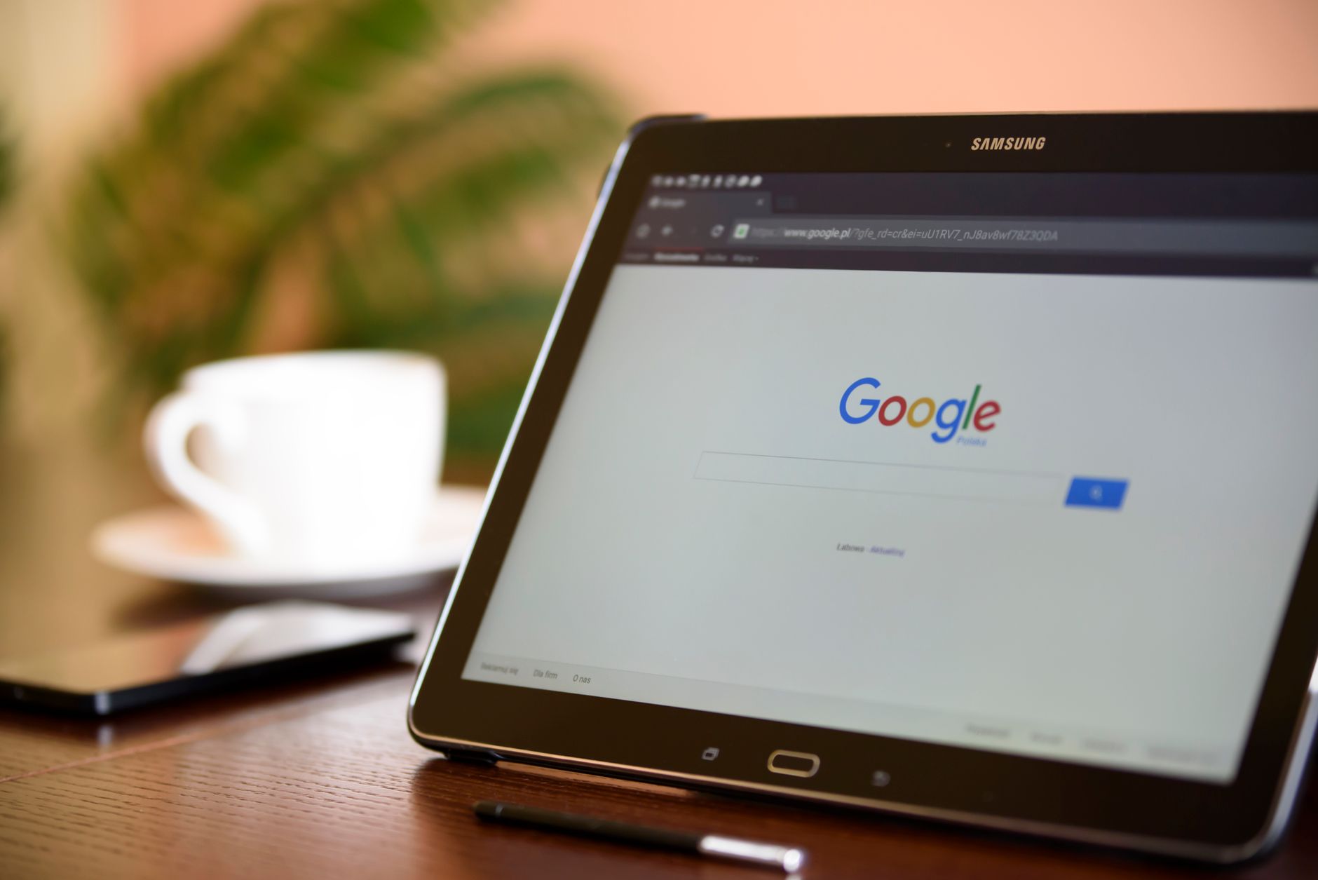 Person reviewing cookie consent settings on a laptop with a compliance checklist