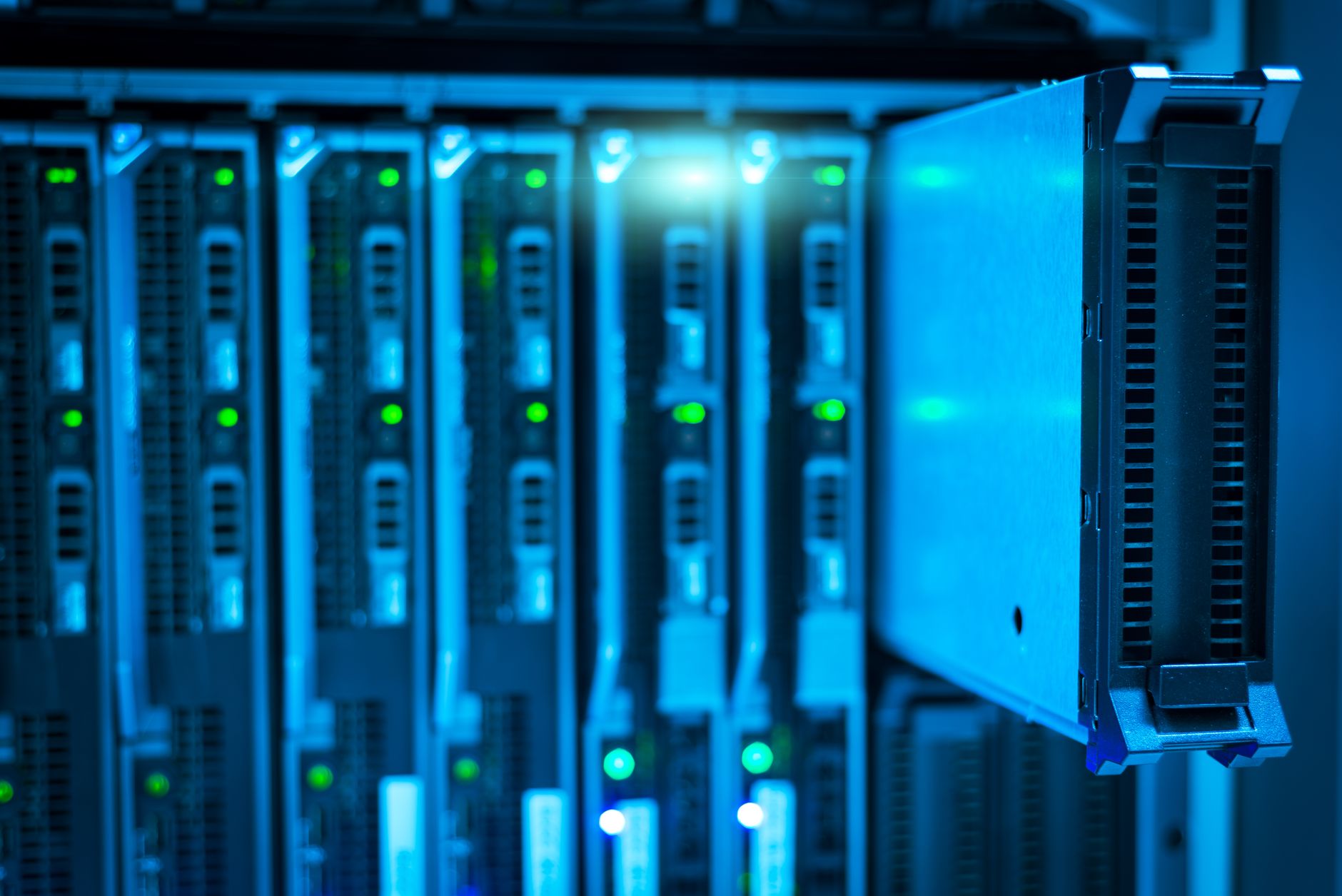 Data center aisle with servers and cooling systems representing AI energy demand in 2026