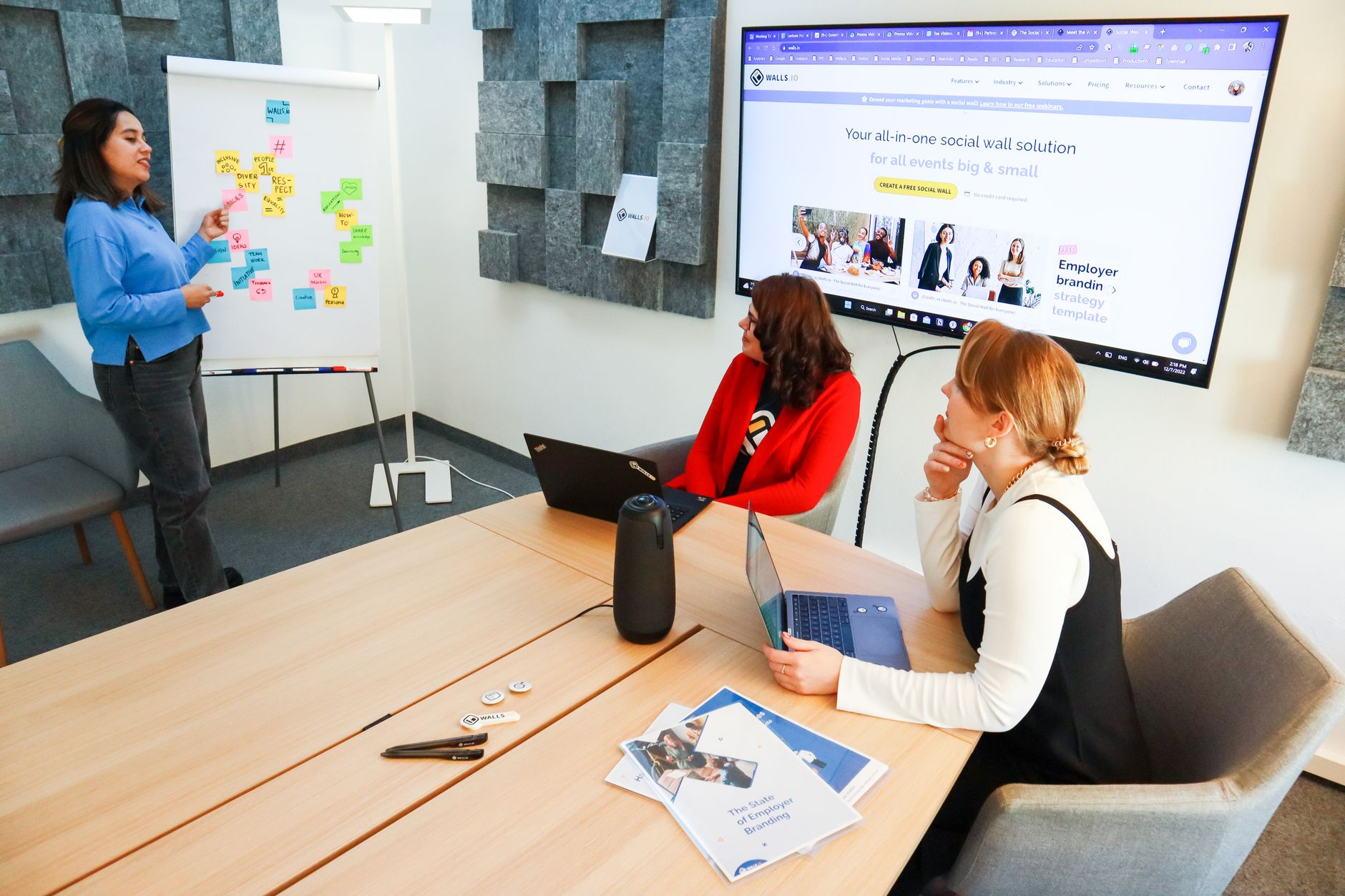 International ecommerce team reviewing EU accessibility compliance checklist on laptop