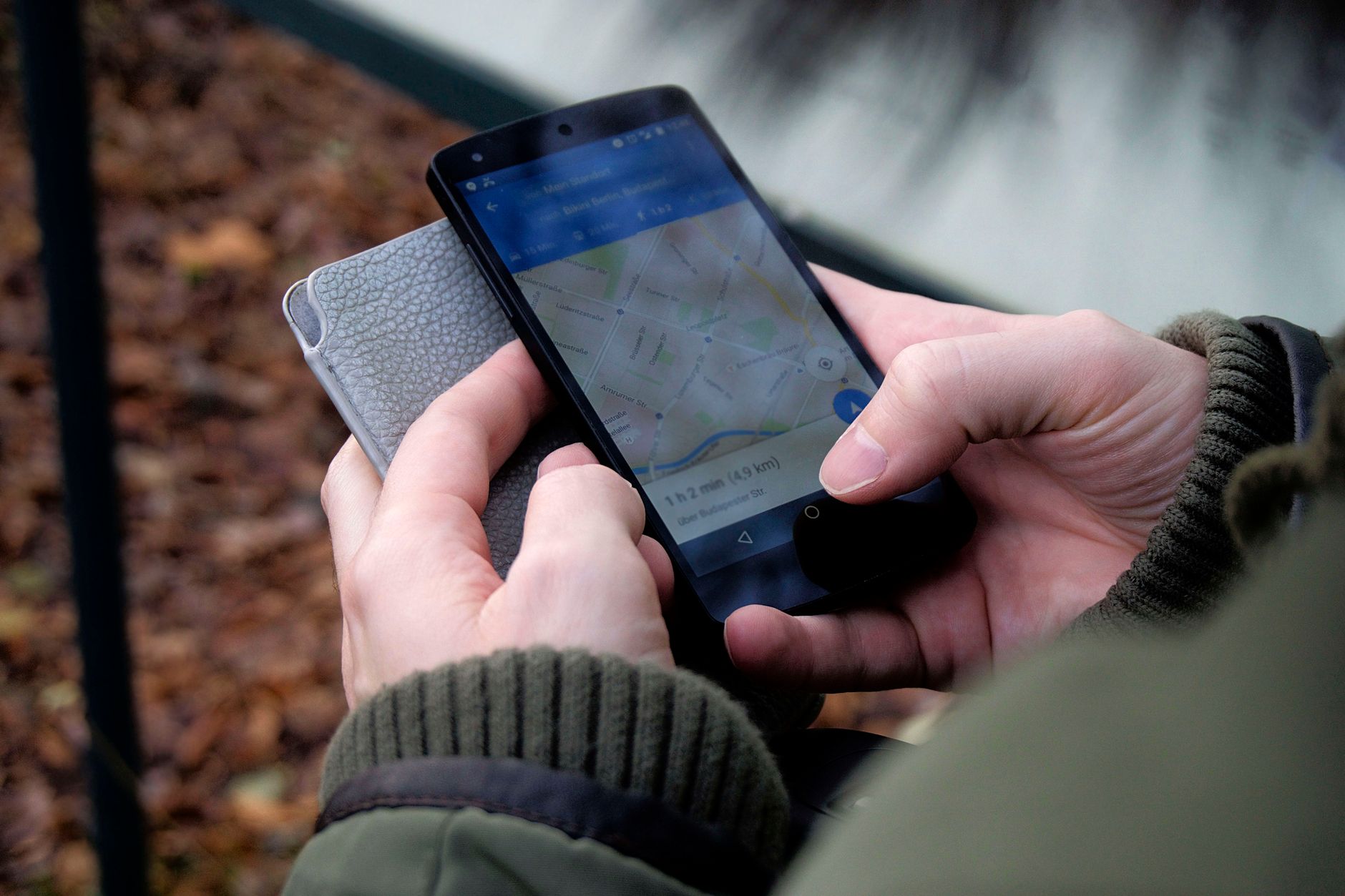 Traveler using a smartphone for mobile check-in in an airport terminal