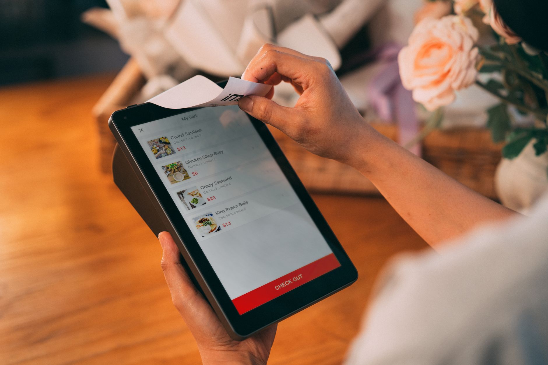 Person shopping online with an accessibility settings panel open on a laptop