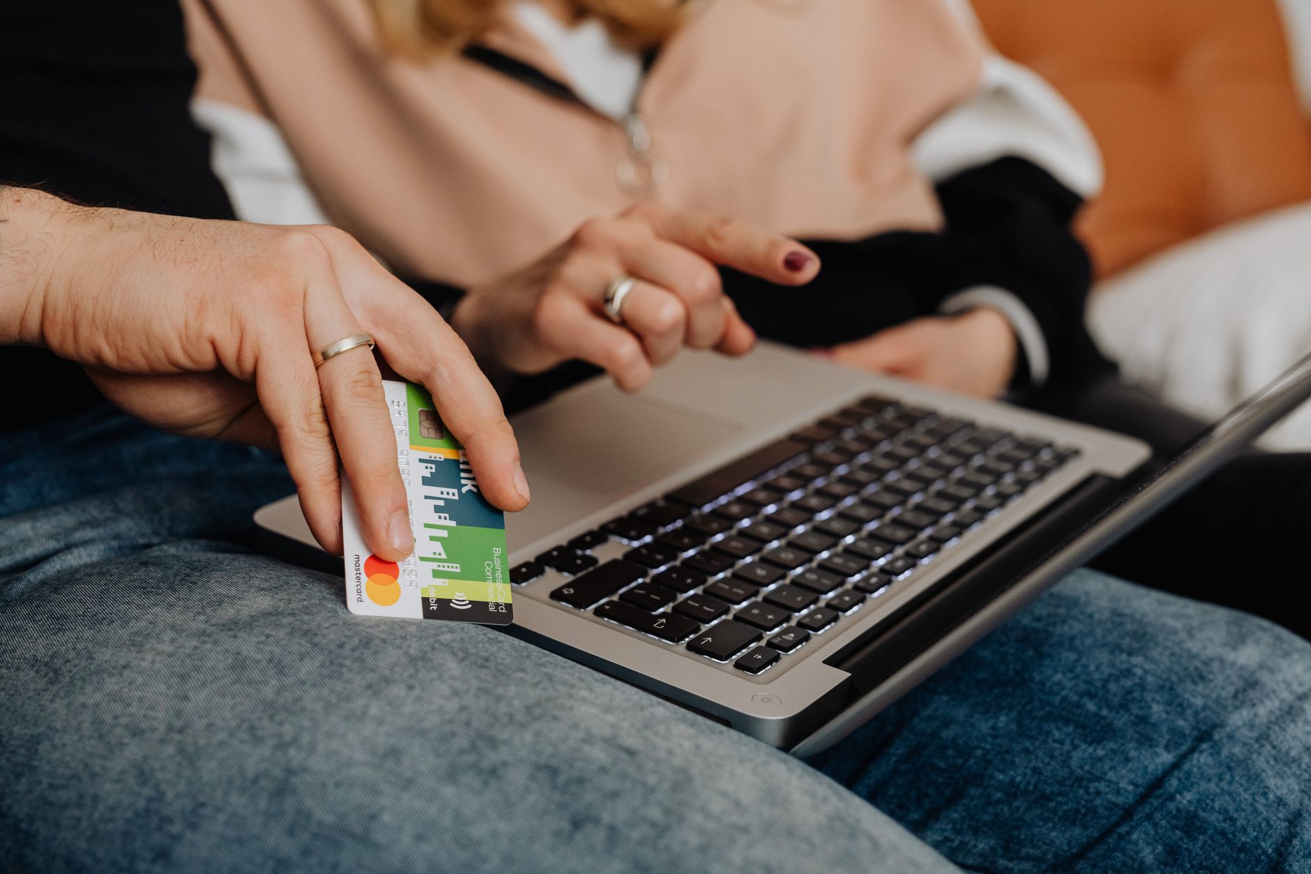 Person shopping online with an accessibility settings panel open on a laptop