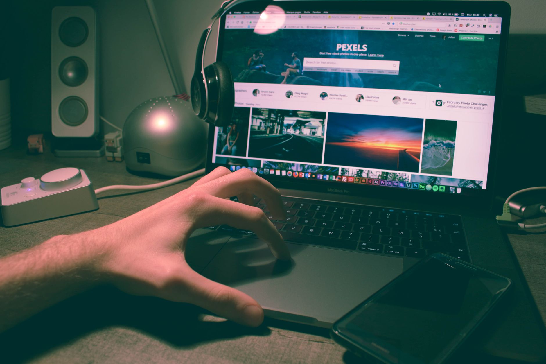 Developer reviewing website audit showing SEO and accessibility issues on a laptop