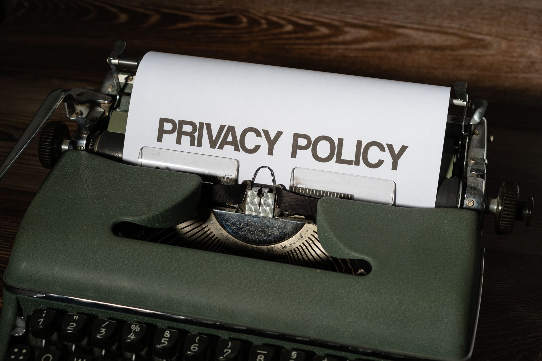 Person reviewing a cookie consent banner and compliance checklist on a laptop