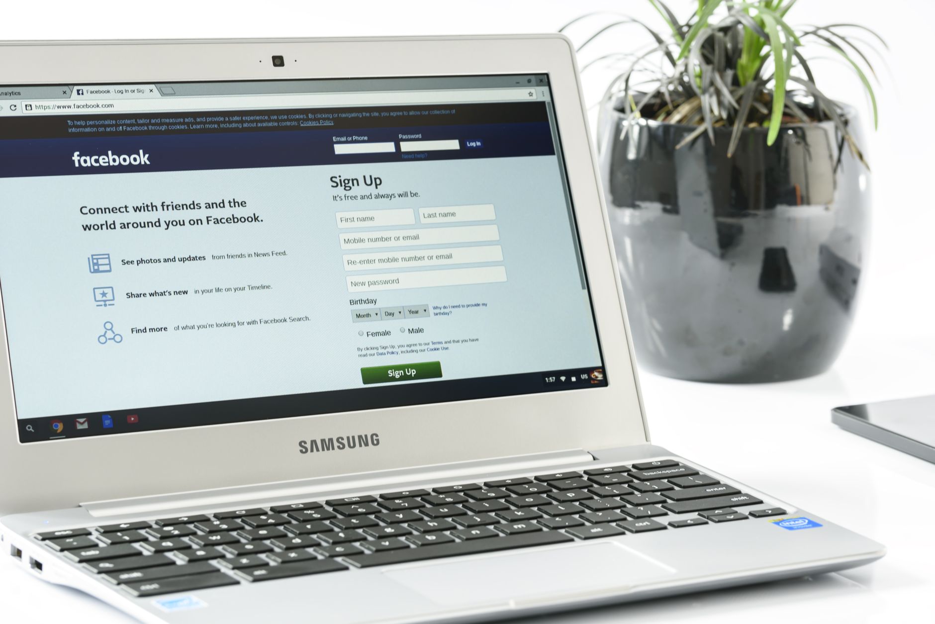 Person reviewing website footer links for privacy policy and accessibility statement on a laptop
